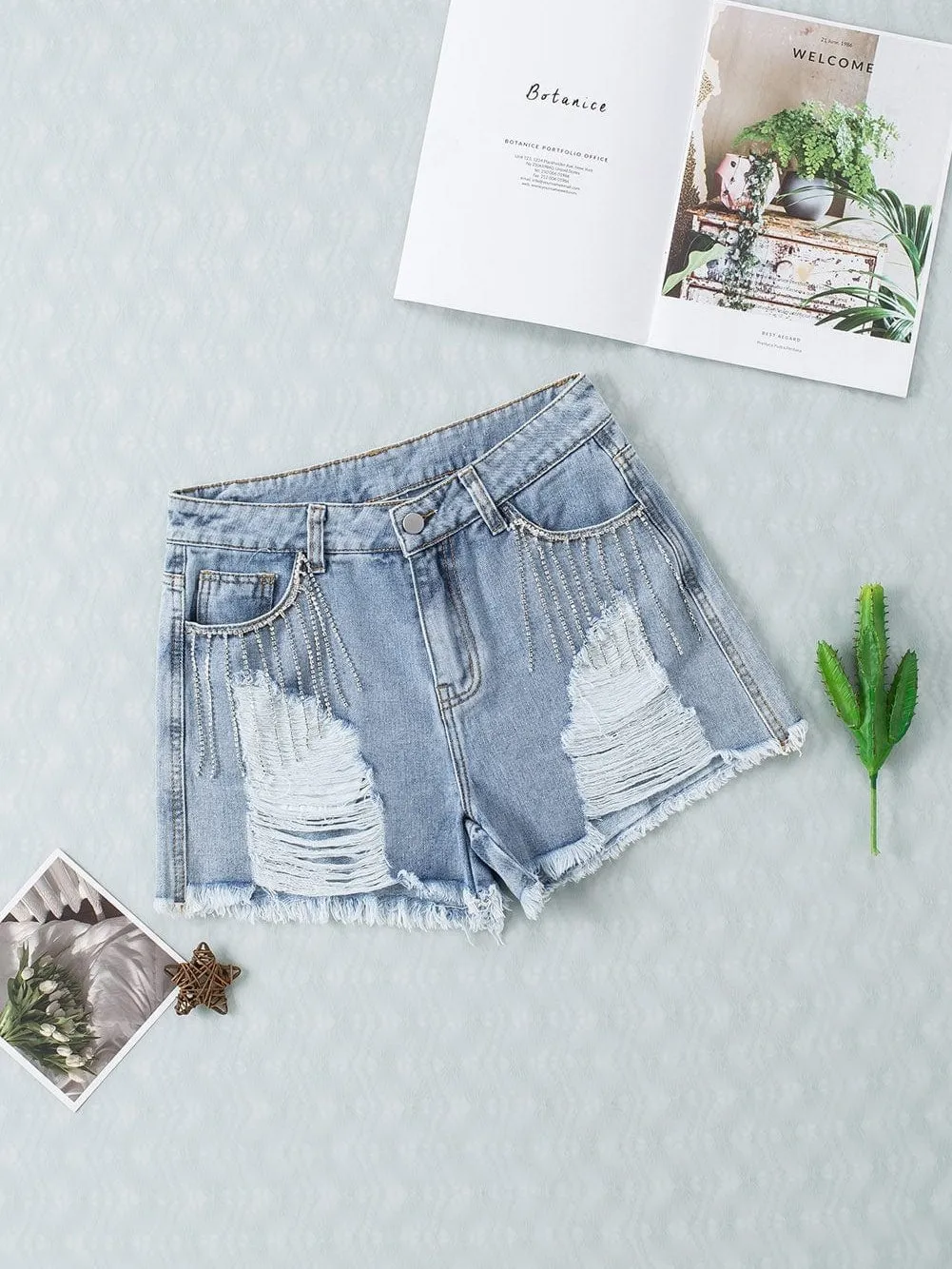 Blue Denim Shorts with Unique Rhinestone Design